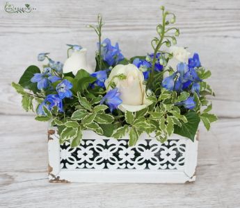 Small, inwrought wooden chest, with roses and delphiniums