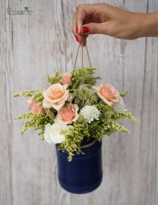 Hanging decoration in a blue jar (spray rose, solidago, peach)