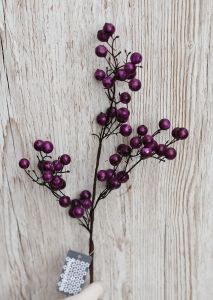 Artificial branch with purple berries