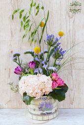 flower delivery Budapest - Lavender cylinder box with hydrangea and airy flowers 