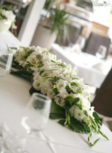 Main table centerpiece Hemingway Restaurant (orchid, gladiolus, cala, button chrysanthemum, white, green), wedding