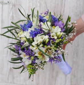 Shaggy bridal bouquet with spring flowers