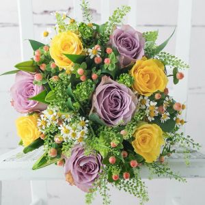 Round summer bouquet with 8 roses and small flowers