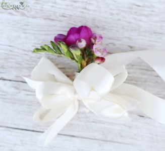 wrist corsage made of freesia and wax (pink)