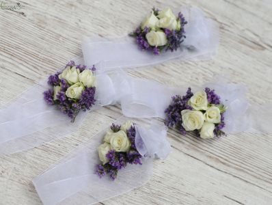 wrist corsage made of statice, spray roses, white, purple)