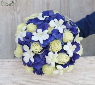 Bouquet of blue hydrangeas and white roses, with white orchids