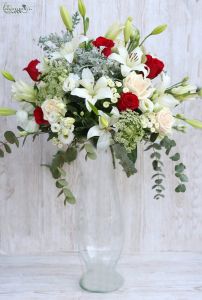 Centerpiece on a tall vase (lily, lisianthus, rose, wild flowers, white, cream, red)