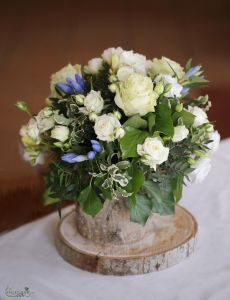 Centerpieces in wooden logs, (lisianthus, rose, gentiana, blue, white ) Szendehely, Szepi Restaurant