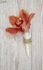 Orange orchid boutonniere