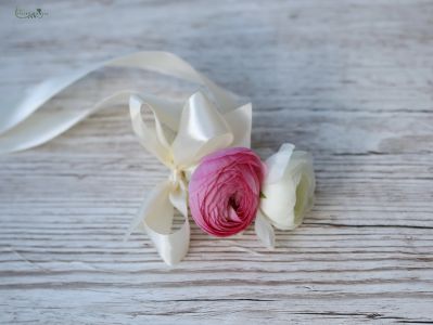 wrist corsage made of ranunculus (white, pink)