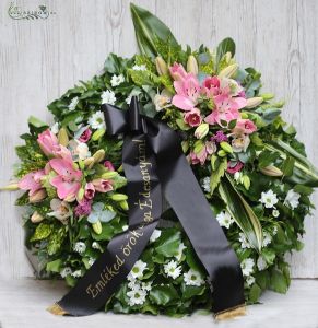 Ivy wreath decorated on two spots, with aisiatic lilies and orchids 70cm