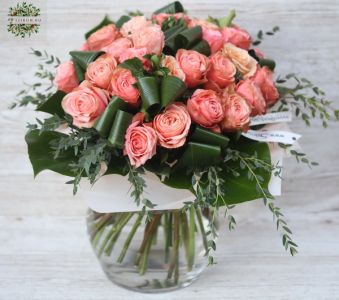 35 peach roses in glass ball with greenery