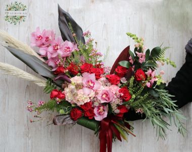 big crescent bouquet with orchids and roses