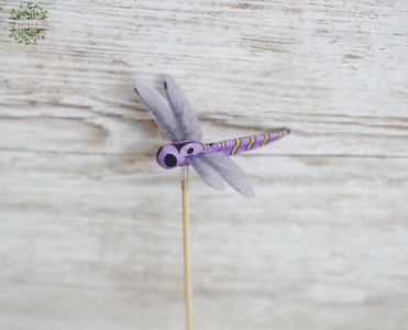 Libellenfigur auf einem Stock