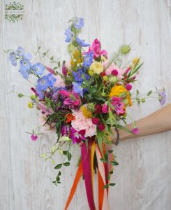 Loose colorful bouquet with English roses and seasonal summer flowers