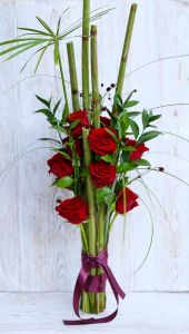 10 red roses in paralel bouquet