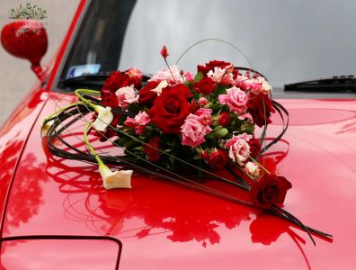 Heart shaped modern car decor with red roses, callas, lisianthusses