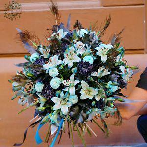 Giant blue lily bouquet with peacock feathers