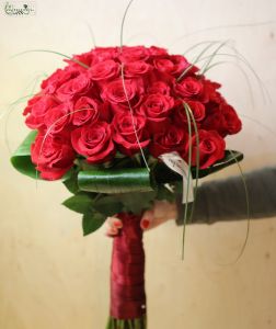 40 premium red roses in a compact bouquet