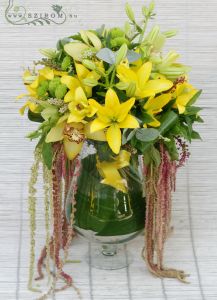Main table centerpiece (aisiatic lilies, orchids, pompons, yellow), wedding
