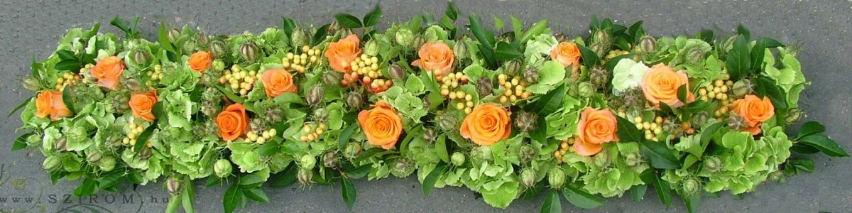 Main table centerpiece (roses, hydrangeas, green, orange), wedding