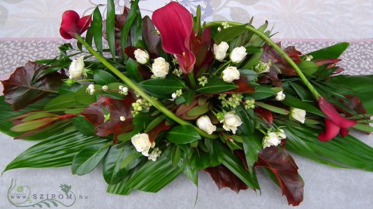 Main table centerpiece (spray roses, calla, leucadendron, red), wedding