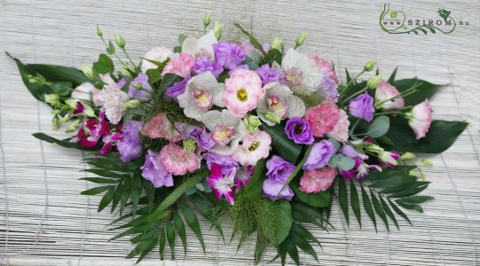 Corner car flower arrangement with lisianthus and orchids (purple, pink, white)