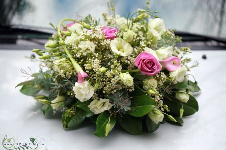 round car flower arrangement with small flowers