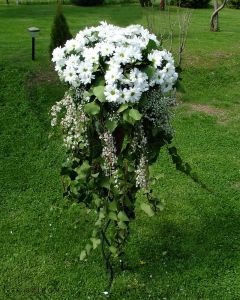 standing flower arrangement with daisies, wedding