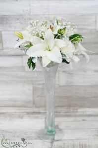 Tall vase centerpiece with white lilies, winter decor, wedding