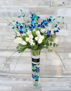 Tall vase with tulips, blue orchids, wedding