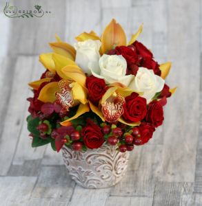Centerpiece with orchids and roses, autumn (red, yellow, orchid, rose), wedding