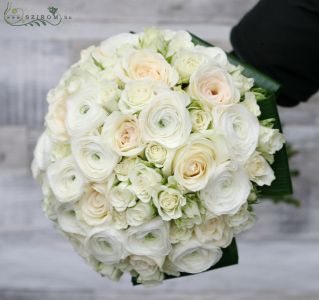 Bridal bouquet of cream roses, mini roses, ranunculusses. White, cream.