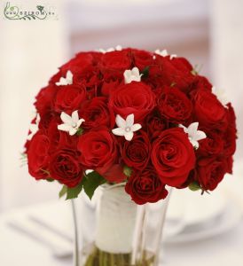 Bridal bouquet with red roses and spray roses and stephanotis