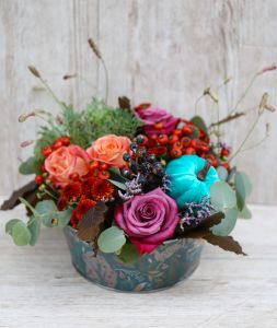 Autumn flower bowl with pumpkin, in metal pot with woodland animal pattern