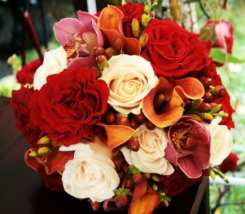 calas, orchids, roses, hypericum (24 stems)