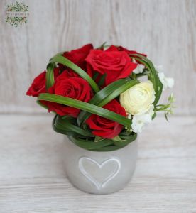 small pot with heart and 7 red roses, spring flowers