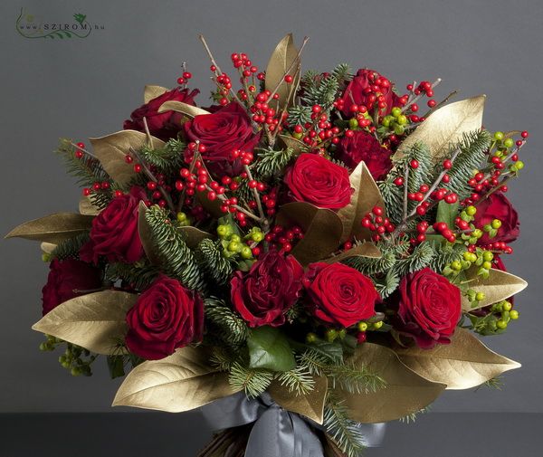 24 red roses in a bouquet with bronze leafs, red ilex berries, pines