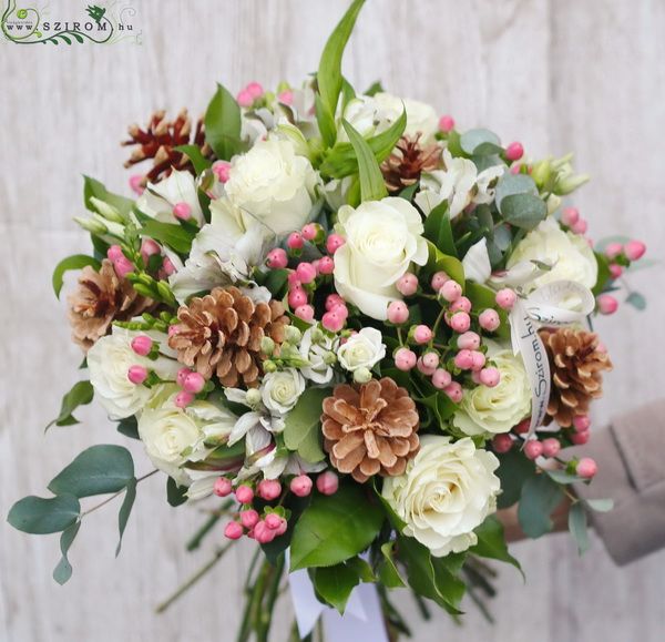 Winter bouquet with pink hypericums