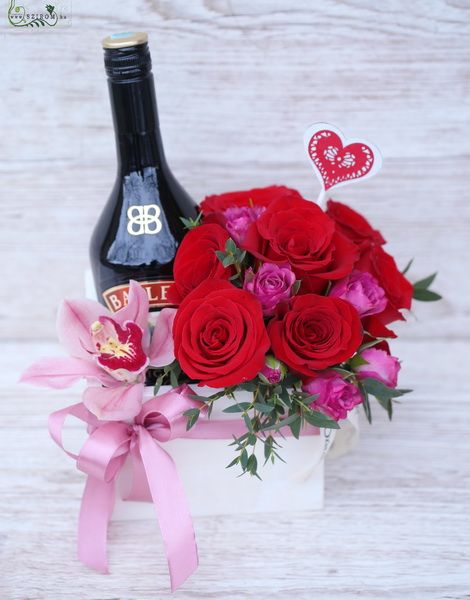 Wooden box with roses, orchid and Baileys