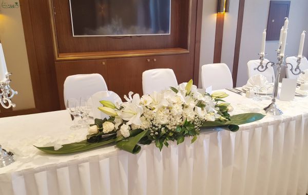 Main table centerpiece (lily, lisianthus, white) Hilton