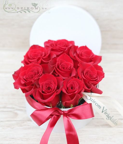 9 red roses in a paper box