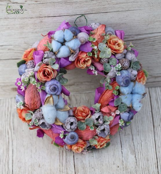Colorful summer doorwreath with cottonflowers