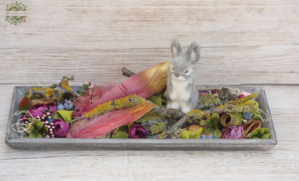 Spring arrangement in wooden bowl with bunny