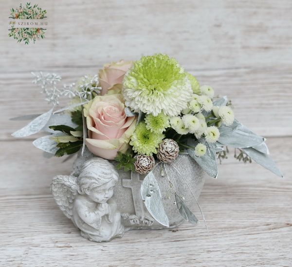 Angel pot with pastel flowers