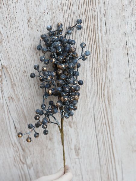 Artificial branch with blue berries