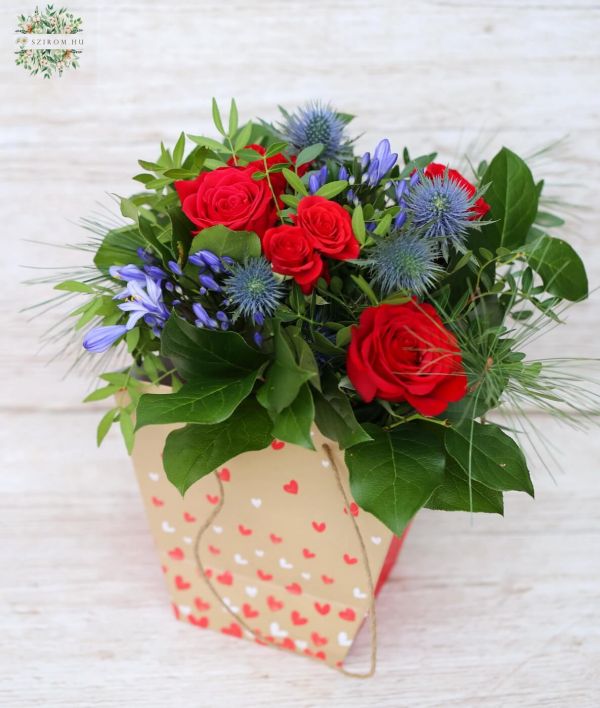 Small red rose bouquet with agapanthus, eryngium (9 stems) in aquapack paperbag