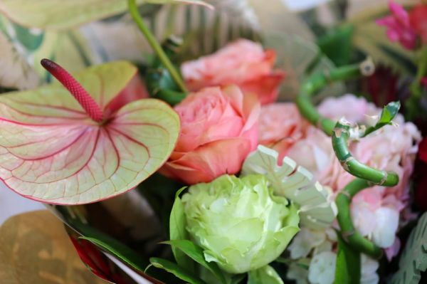 Summer tropical moon bouquet with flamingo flower, roses, bamboo, wooden palm leaves (14 stems)