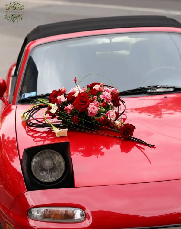 Heart shaped modern car decor with red roses, callas, lisianthusses