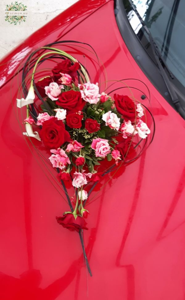 Heart shaped modern car decor with red roses, callas, lisianthusses